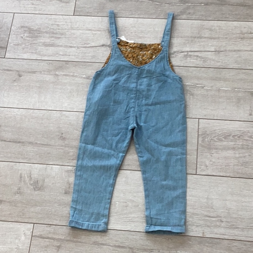 Zara overalls with flowers inside.